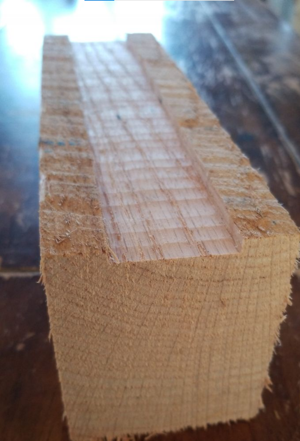 Close-up of a grooved wood dunnage board